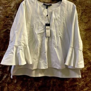 BCBG white tulip sleeve top. NWT
